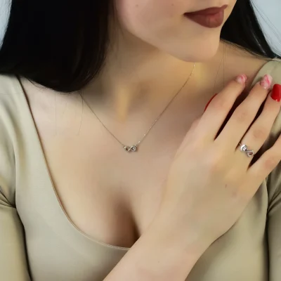 Lantisor infinit aur alb 14K cu diamant natural